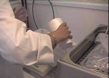 AI adding semen to diluent